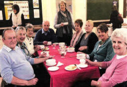 A group of happy customers and volunteers pictured at the 'Bread and Cheese Lunch' in First Lisburn Presbyterian Church Hall last Tuesday afternoon (October 26) as the team celebrate their 30th anniversary year. Included are (back row) Rev John Brackenridge and L to R: (front row) Cecil Kirkwood, Mervyn and Hazel McCall with their daughter Helen Conroy and their granddaughter Grace and Abby, and Percy McCall