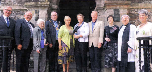 At the Annual Community Service in the Parish Church of St Patrick, Drumbeg are L to R: Mr Alexander Wood (Churchwarden), Hugh Crookshanks (Drumbeg Residents Association Chairman), Mrs Beryl Dean (Drumbeg Residents Association President), Councillor Allan Ewart (Mayor), Mrs Denise Ewart (Mayoress), Lady Karen Girvan (Action Medical Research), Sir Paul Girvan, Mrs Kathy Devenney, Rev Raymond Devenney (Rector) and Mrs Margaret Jordan (Churchwarden).