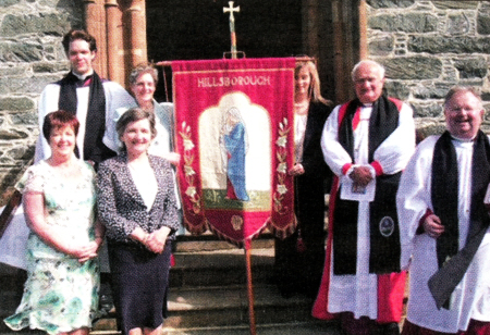 Back row: Rev Simon Richardson, Mrs Jeanette Shannon and her daughter Mrs Louise McCambley, Lord Eames and Canon Robert Howard. Front, left: Mrs Roberta Rodgers and Mrs Ruth Mercer.