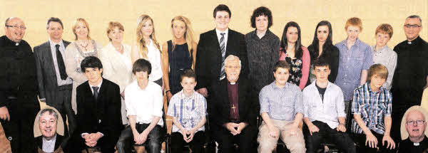 Rt Rev Harold Miller (Bishop of Down and Dromore) pictured with seventeen candidates from Drumbeg, Drumbo and Saintfield Parish Churches prior to the joint Confirmation Service in the Parish Church of St Patrick, Drumbeg on Sunday evening 1Oth April. Included are Rev Willie Nixon, Area Dean (left) and Rev Chris Pollock, Vicar of Saintfield Parish Church (right). Inset photos: Drumbeg Rector, Rev Raymond Devennev (left) and Drumbo Rector. Rev Robert Neill (right).