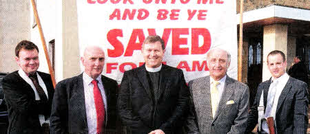 Jonathan Mackin (left) and Richard Lockhart (right) with the banner which headed up the 'March of Witness'. Included are L to R: Noel Shields (Evangelist), Rev Gary Goodes (Minister) and David Williamson (Clerk of Session).