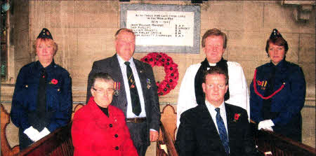 Back row, left to right: Isobel McAuley People's Warden, Lawrence Smylie, the Rev Nicholas Dark, and Yvonne Belshaw, Rector's Warden. Seated are Alice and James Smylie