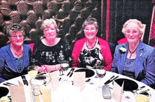 At Legacurry Wl's 60th Anniversary dinner are Moyra Baird, Jennifer Johnson, Elizabeth Halliday, and lrene McKeown US0811-405PM