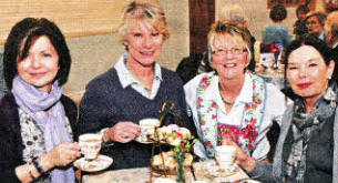 The Wallace Connection: Debbie Neill, Elizabeth Ramsey, Carolyn Gowdy and Mary McKay, Wallace High School teachers past and present, enjoying a Christmas treat of tea, scones and speciality cakes in Railway Street Presbyterian Church.