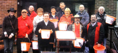 Members of St Paul's who pushed a well through Lisburn city centre last 
	Saturday to raise money for a water pump in Kenya