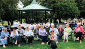 Some members of Seymour Street Methodist Church enjoying 'Hymns in the Park'.