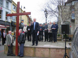 The Rev. Brian Gibson, Minister of Railway Street Presbyterian Church, Lisburn, is pictured welcoming those assembled at Market Square, Lisburn, for a short act of Worship following the Good Friday �Carrying of the Cross� march of witness.