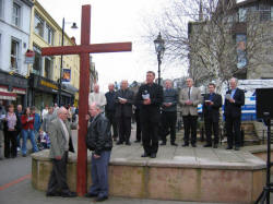 The Very Rev. Sean Rogan - St Patrick�s Roman Catholic Church, is pictured leading the Easter praise during a short act of Worship in Market Square on Good Friday 25th March 2005.