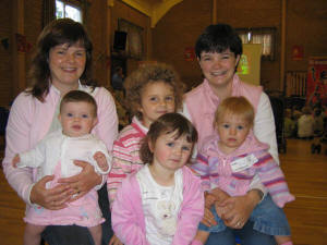 Two young mums who combined their leadership and mothering skills at Ballinderry Presbyterian Church Holiday Bible Club. Joanne Moore (left) with her daughter Anna and Robyn Hampton with her daughter Abbie. Included in the photo - Katie Collins and Tori Hampton (front).