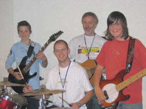 Kris Platt, Des Cameron and Tim Napier, led the lively praise at the �Champions Holiday Bible Club� in Hillsborough Elim Pentecostal Church on Monday 22nd to Friday 26th August 2005.