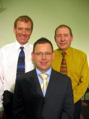 Pastor Steven Neill pictured last Sunday evening with elders John Bailey (left) and Uel Dickson (right), who helped form the Dromore Elim Pentecostal Church in 1988.