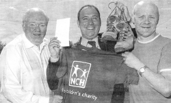 John Kelly (centre) celebrates the well-earned sponsorship money, and is joined by GIFNI members (L-R) David Adams and Phillip Bannon. US23-779SP