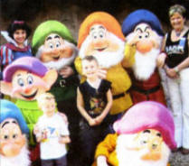 Heigh ho!...it's Brian, Adam, their mum Gaye, Snow White and her trusty dwarves. US19-755SP