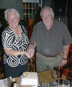 Pat and Nelson Williams cut their 50th wedding anniversary cake