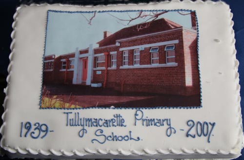 Close up of a cake marking 68 happy years of the present Tullymacarette Primary School.