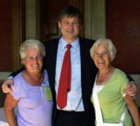 Adrienne Carson (left) and Hazel Corbett with Basil McCrea MLA in the Long Gallery.