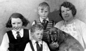 Kelly family photograph taken at Tullymacarette Primary School in about 1952. Mary Emily Kelly (nee Harvey) with Vera (now Vera Watson), George and John.