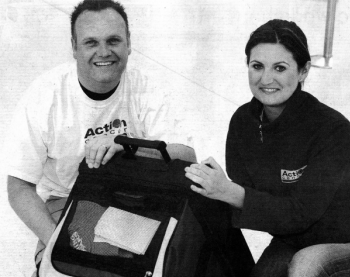 Kelly Shaw from Action Cancer wait with excited Lisburn trekker Aaror Kirk for his departure to India on a 10 day trek for the charity.