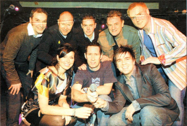 Coca-Cola Production Band David Burton, Stephen Tully, Francie McCann, Brian Burns, Noel Marsden and David Young with host Christine Bleakley and Group's mentor Pete Snodden, Cool FM.