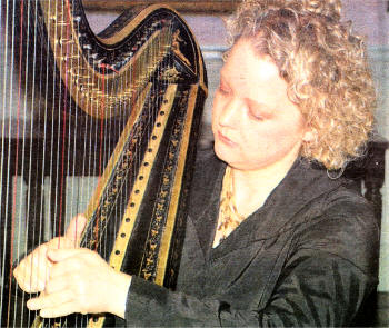 Cliona Doris playing the Egan Harp which was restored by Lisburn Museum. US0907-450CP