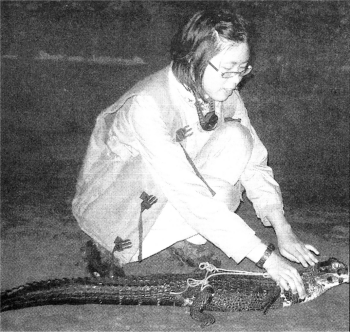 Emma with a Baby Caiman.