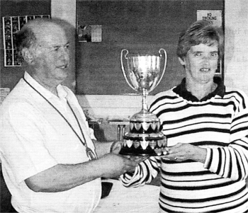 President of the IACR, Ian McCullagh of Kilkenny Cathedral, presents the Cunningham Cup to Hillsborough bellringer, Mrs Daryl Jameson.