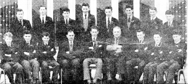 Lisnagarvey Prefects 1959-60. Standing (left to right): E. Allen, S. McLorn, B. Gibson, S. Taylor, A. McGaughey, W. Stewart, C. McElroy, M. Kirkpatrick. Sitting: R. Graham, K. McNeice, R. Irvine, Mr. W. J. Morrison (Headmaster), J. Allen (Head Prefect), Mr. Wm. Thompson (Vice-Principal), V. Grattan (Deputy Head Prefect), K. Brown, J. Finn.