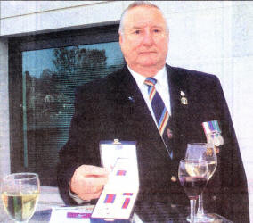 William Doak with his Medals for service in Maylasia. US1607-101A0