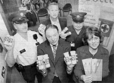 From left, Inspector Stephen Graham, Stephen McCracken, Station Commander Sandy Thompson, Camilla Reynolds and, centre, Tommy Mallon, assistant care manager, Lisburn Health Centre.