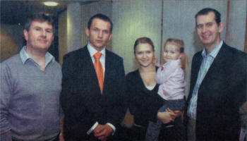 Jeffrey Donaldson, Support workers Daniel Konieczny and Olga Dominiak with her daughter and Edwin Poots at the recent meeting of the Old Warren Partnerships Migrant Workers Project.