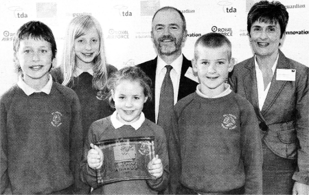 Joaquim noves, Claire McAdam, Bethan Logan, Mr. Ian Thomson, Peter Kelso and Mrs. Magowan with the DfES Award for sustainable schools.