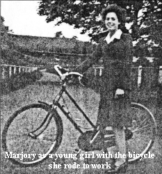 Marjory as a young girl with the bicycle she rode to work