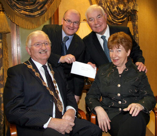 Pictured in the Mayor�s Parlour last Friday morning (19th December) are Colin Preen, Alderman Ivan Davis OBE and Lauren McCarthy presenting a cheque for �300 to Lisburn Mayor, Councillor Ronnie Crawford in support of his chosen charity �Diabetes UK�.  The money was raised at a variety concert held in the Robert Watson Memorial Hall, Hillhall last October organised by Colin and his family and friends.