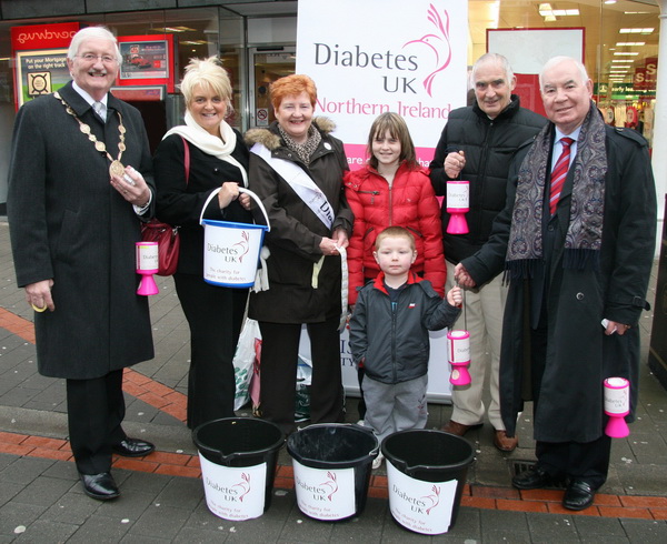 Pictured during a street collection in Bow Street, Lisburn last Monday 22nd December which raised �907 for the Mayor�s chosen charity Diabetes UK are L to R: Lisburn Mayor Councillor Ronnie Crawford, Dromore Councillor Carol Black, Beverley Matherson, Victoria Black, Jim Emery, Alderman Ivan Davis OBE and Jordan Nunleavey (front). 11-year-old Victoria has had Diabetes since she was 9 months old and Jordan, whose mother was most keen to support the collection, has been Type 1 insulin dependent for the past year.