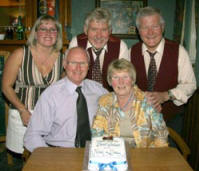 Noel McMaster and Drew Rowan of Bakerloo Junction and band secretary Catherine O�Reilly pictured at the band�s final show at the Ivanhoe. Included are Mervyn and Sadie Graham who in addition to celebrating Sadie�s retirement after 30 years as Carr Primary School secretary, are looking forward to celebrating 40 years of marriage on Friday 4th July.