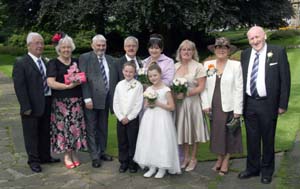 The bridal party L to R: John and Margaret McFarlane, Colin Rea, John McFarlane, Lillian Nicholson, Catherine O�Reilly, Betty and Tommy Cardwell. (front) James Glennan and Jaimee Reid.