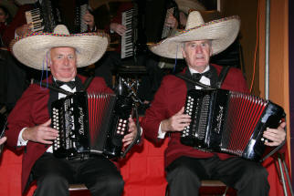 Baillies Mills Accordion Band members Sammy Pollock and Arthur Gibson don sombreros creating a carnival mood as the band plays the well known tune, �Spanish Eyes�.