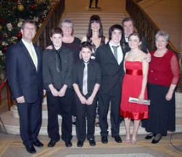 Lagan Valley MP Jeffrey Donaldson pictured with youngest band members Jordan, Gregg and Reuben Hanna. Included are Aimee Consiglia and May Waksow (right) and Annie Phillips, Karen Hanna and Wesley Hanna (back row).