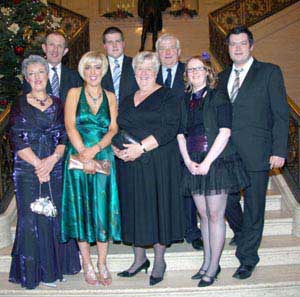 L to R: (front row) Margaret Cummins, Alison Cummins, Patricia Ross and Lyndsay Murray. (back row) David Cummins, Mark Ross, Alan Ross and Colin Ross.