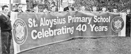 Mr McClean, Principal and pupils from St Aloysius Primary launch the schools' 40th anniversary celebrations