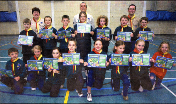 The first members of the re-formed 4th Lisburn Cub Scouts who were recently invested with leaders David Hilland (Group Scout Leader), Tracey Hilland (Cub Scout Leader), and Jonathan Acheson (Assistant Cub Scout Leader) US2408-403PM Pic by Paul Murphy