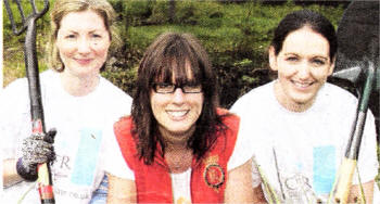 Nemonie Fulton, (left) Associate Solicitor at Cleaver Fulton Rankin, Hilary Dickson from Business in the Community and trainee solicitor Gillian Edge, are hard at work.