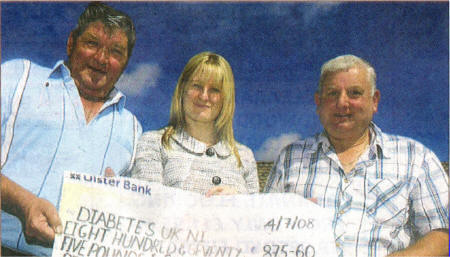 Geordie Wilkinson and Russell Beck presnting a cheque for �875 to Jennie McGivern, National FundRaising manager for Diabetes UK Northern Ireland.