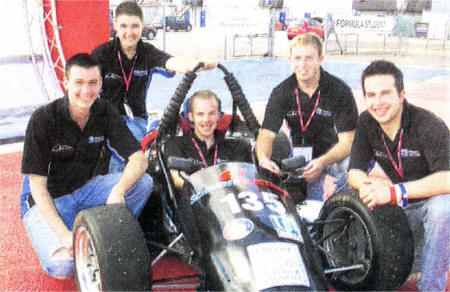 L-R at the 'Formula Student' event in Silverstone is the University of Ulster team Chris Robb from Nutts Corner, Brian Matthews from Crossgar, Ronan Lavery from Glenavy (Team Captain), Andrew Boyd from Coleraine and Sean Connolly from Newry. Steven Robb from Nutts Corner is missing from the photo.