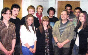 Former Wallace High students who gathered at the school this week to set up a Past Choristers Society, pictured with Head of Music David Falconer.