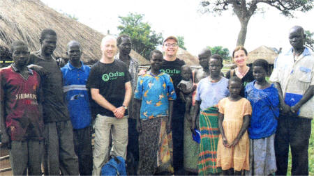 SHOWING THE COLOUR... Oxfam Ireland's 1(0 Ryan and Paul Dunphy wore the charity's T-shirts whilst visiting the Palabek Gem transit camp 
