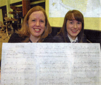 Music teacher Emma Collins with Year 12 pupil Jessica Given at Laurelhill Community College's charity spring concert. US1108-403PM