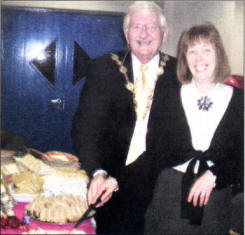 With the cake to celebrate the 10th anniversary of the Lisburn branch of Diabetes UK Mayor Ronnie Crawford and Diabetes Nurse Hilda Francey.