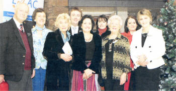 Members of Lisburn Arts Advisory Committee pictured at the harp recital in Lisburn Museum. US4608-504cd