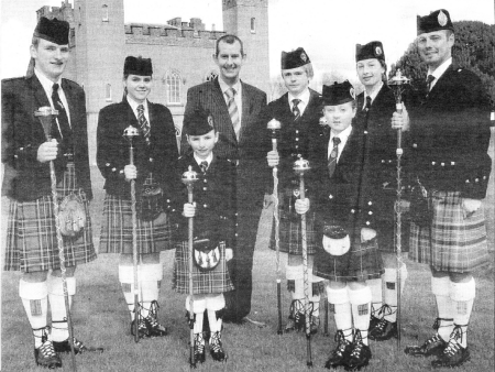 Elizabeth Sloan (back row second from left) and Emma Barr (front row left) with Culture, Arts and Leisure Minister Edwin Poots and the five other Northern Ireland drum majors who will travel to Sacramento.